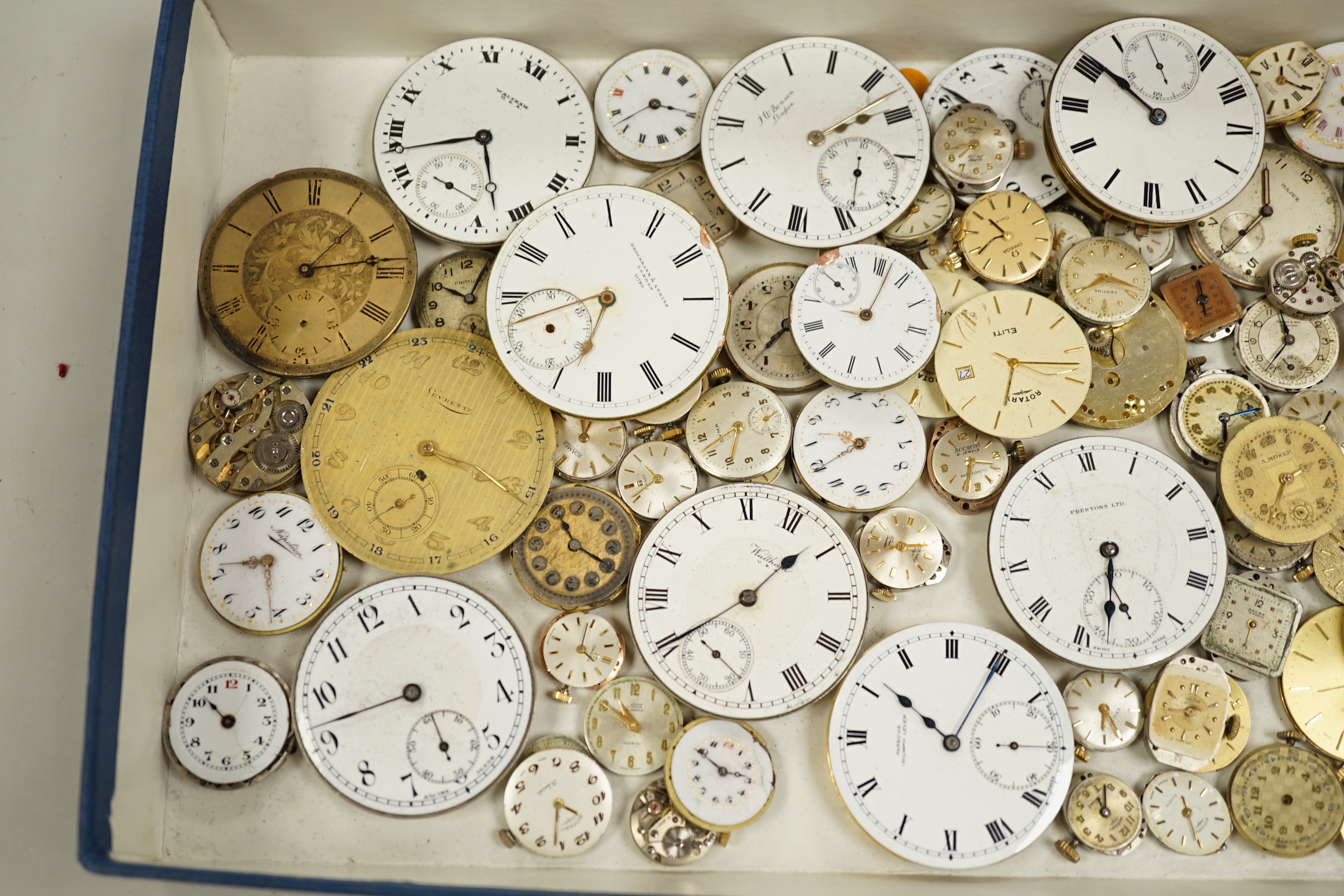 A group of assorted wrist watch pocket watch movements.